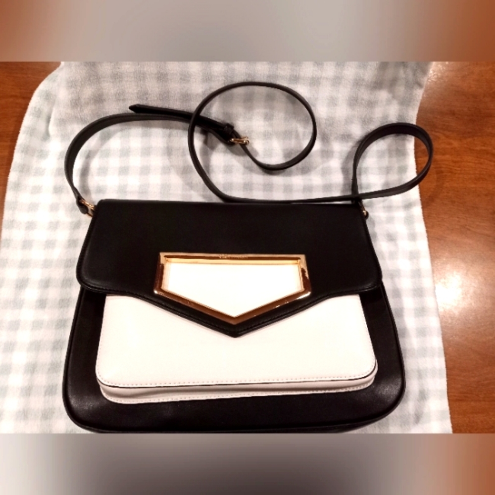 Calvin Klein shoulder bag 11.5"inches wide by 9 inches long  black and white